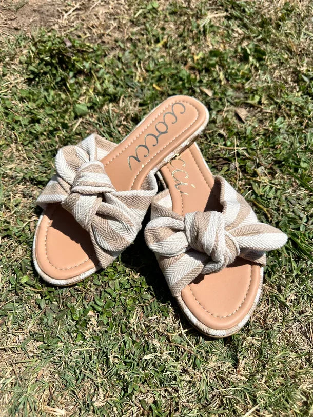 RACHEL STRIPED TAUPE SANDAL with a bow on top, perfect for summer outfits from Raggdoll Boutique.
