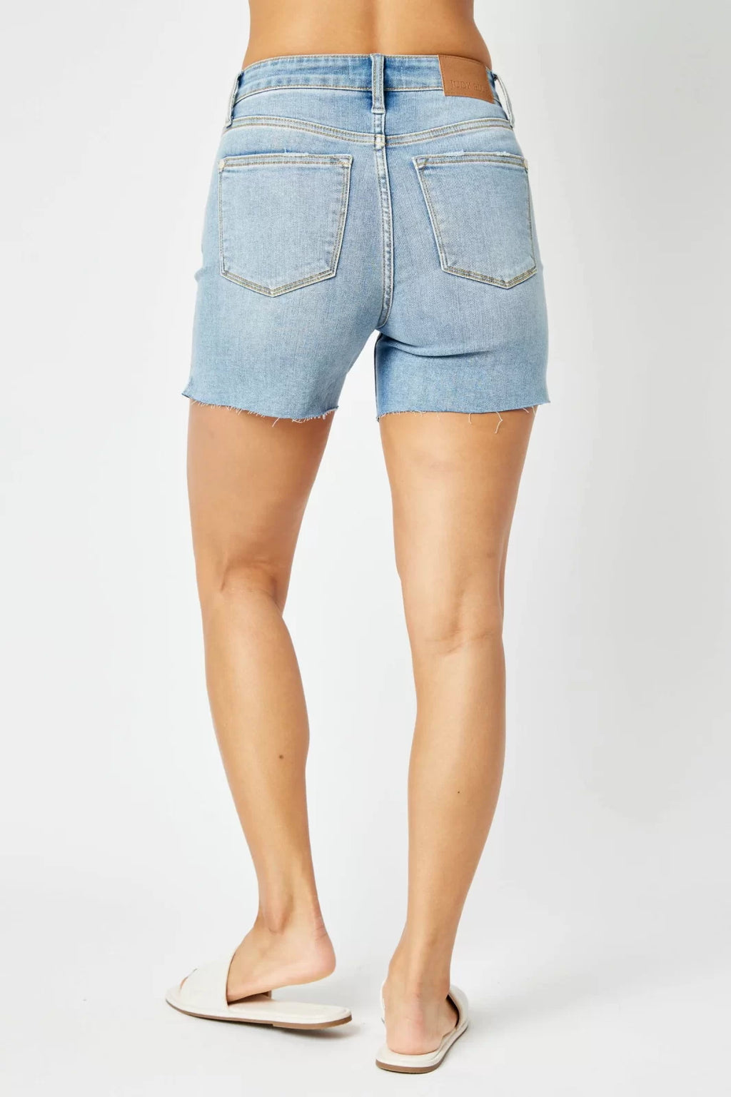 JUDY BLUE CUT OFF RAW HEM SHORTS-MID RISE perfect for summer outfits Texas from Raggdoll Boutique.