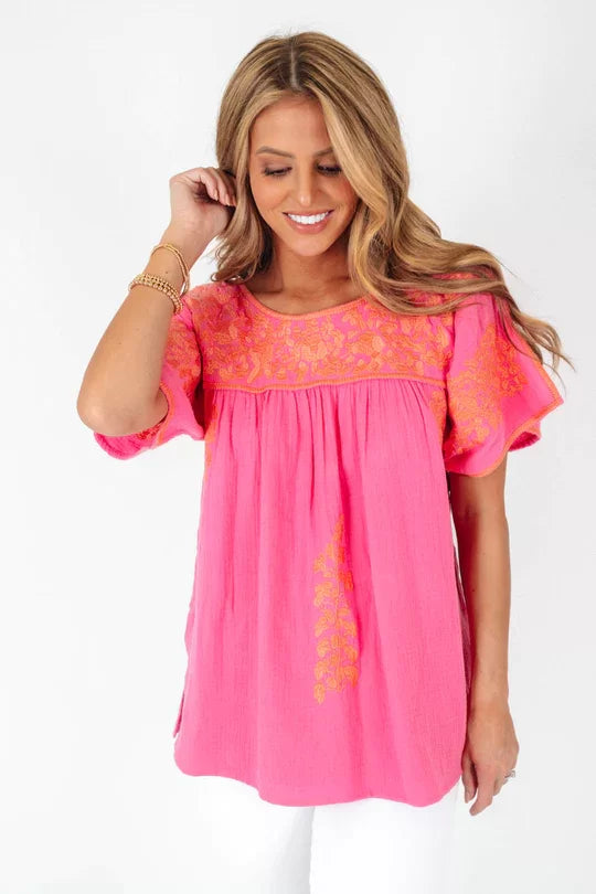 THE COURTNEY TOP from Raggdoll Boutique in vibrant pink, perfect for summer outfits Texas and coastal fashion.