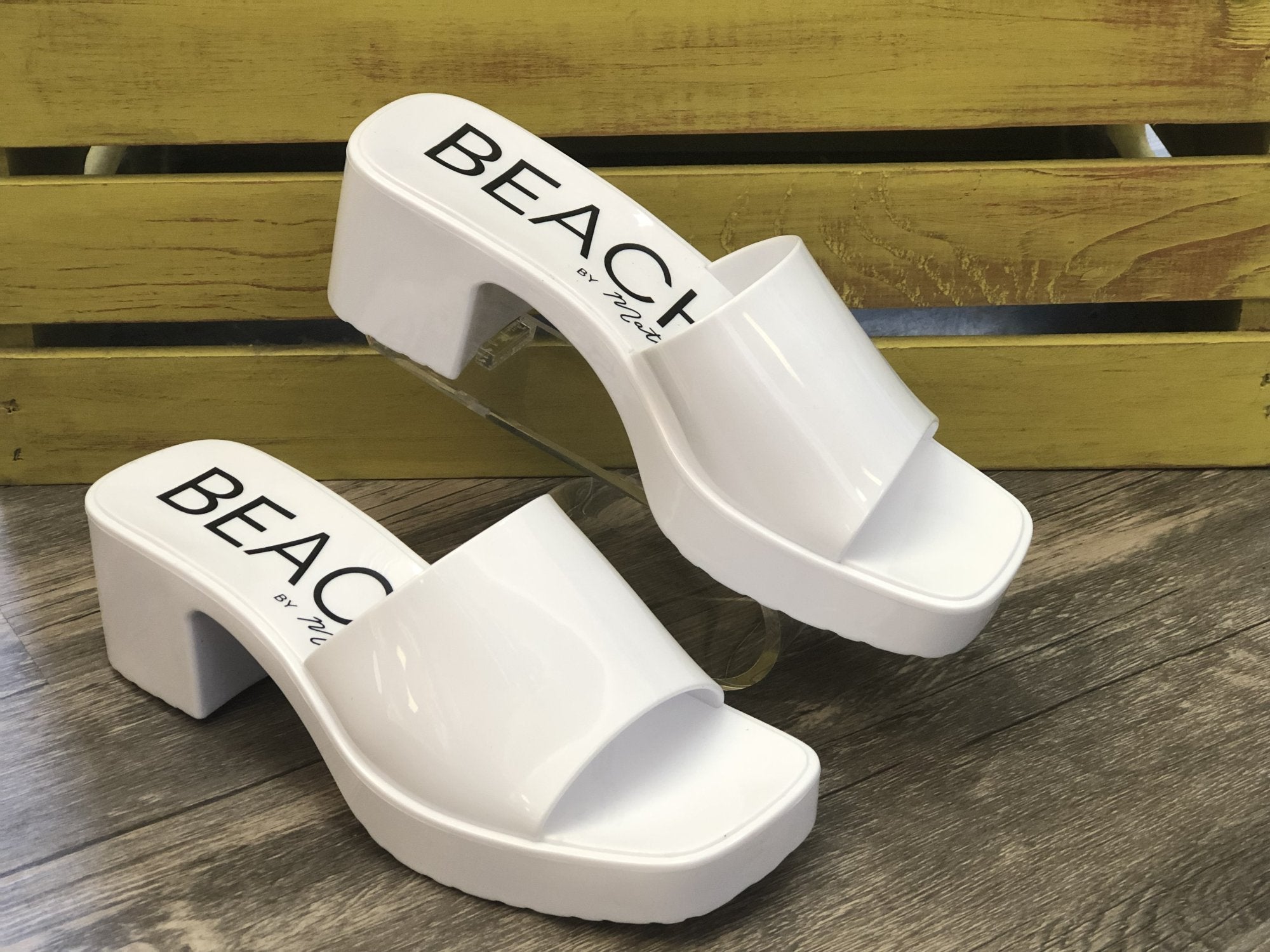 WHITE SLIDE SANDALS from Raggdoll Boutique, perfect for trendy coastal style and summer outfits Texas.