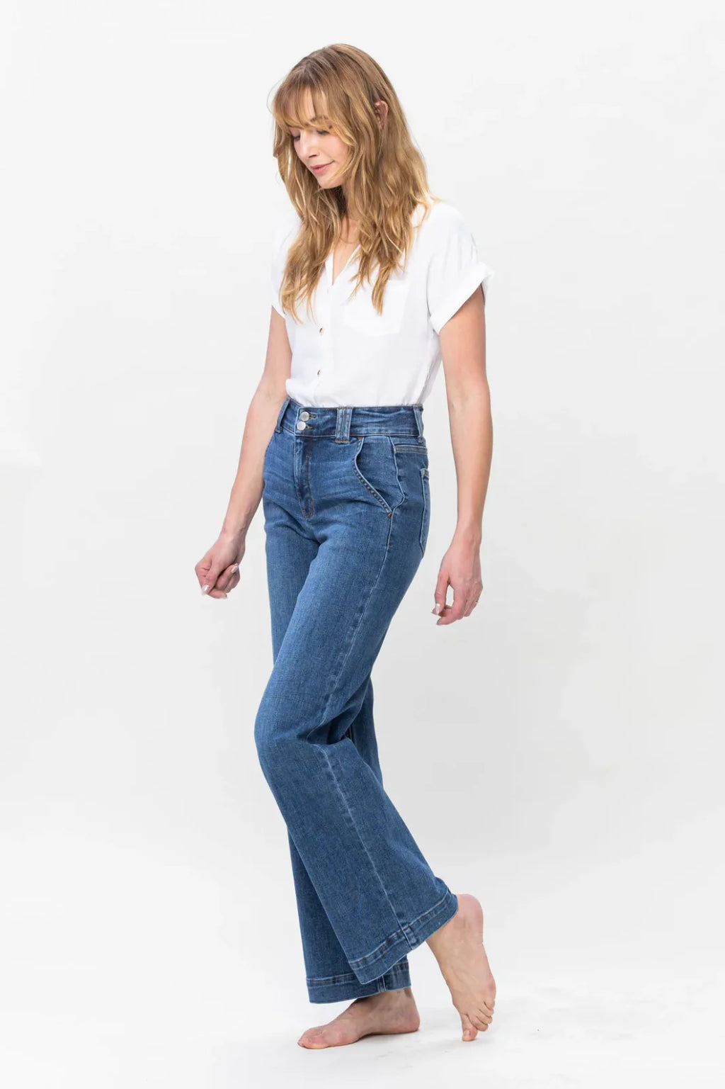 Model wearing JUDY BLUE HW double button wide leg jeans, styled with a white top—perfect for a coastal boutique clothing look.