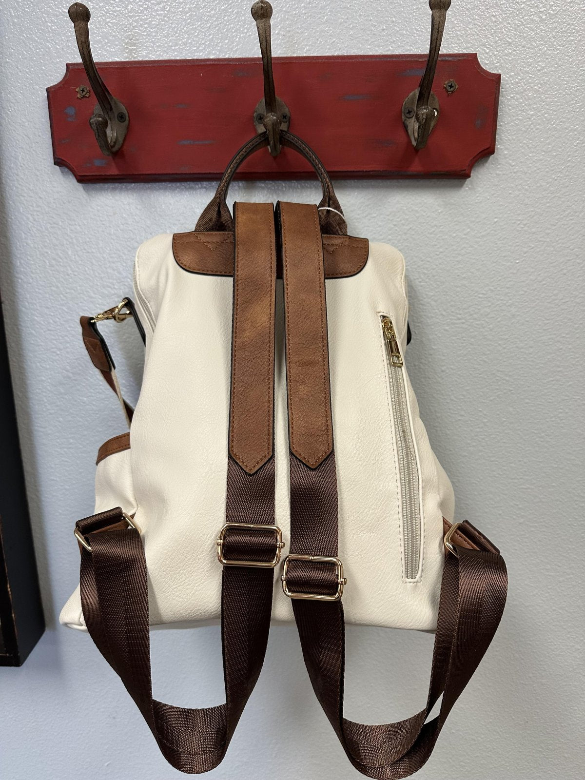Stylish 2 Tone Back Pack displayed, perfect for coastal boutique clothing and gifts from Port Aransas boutique.