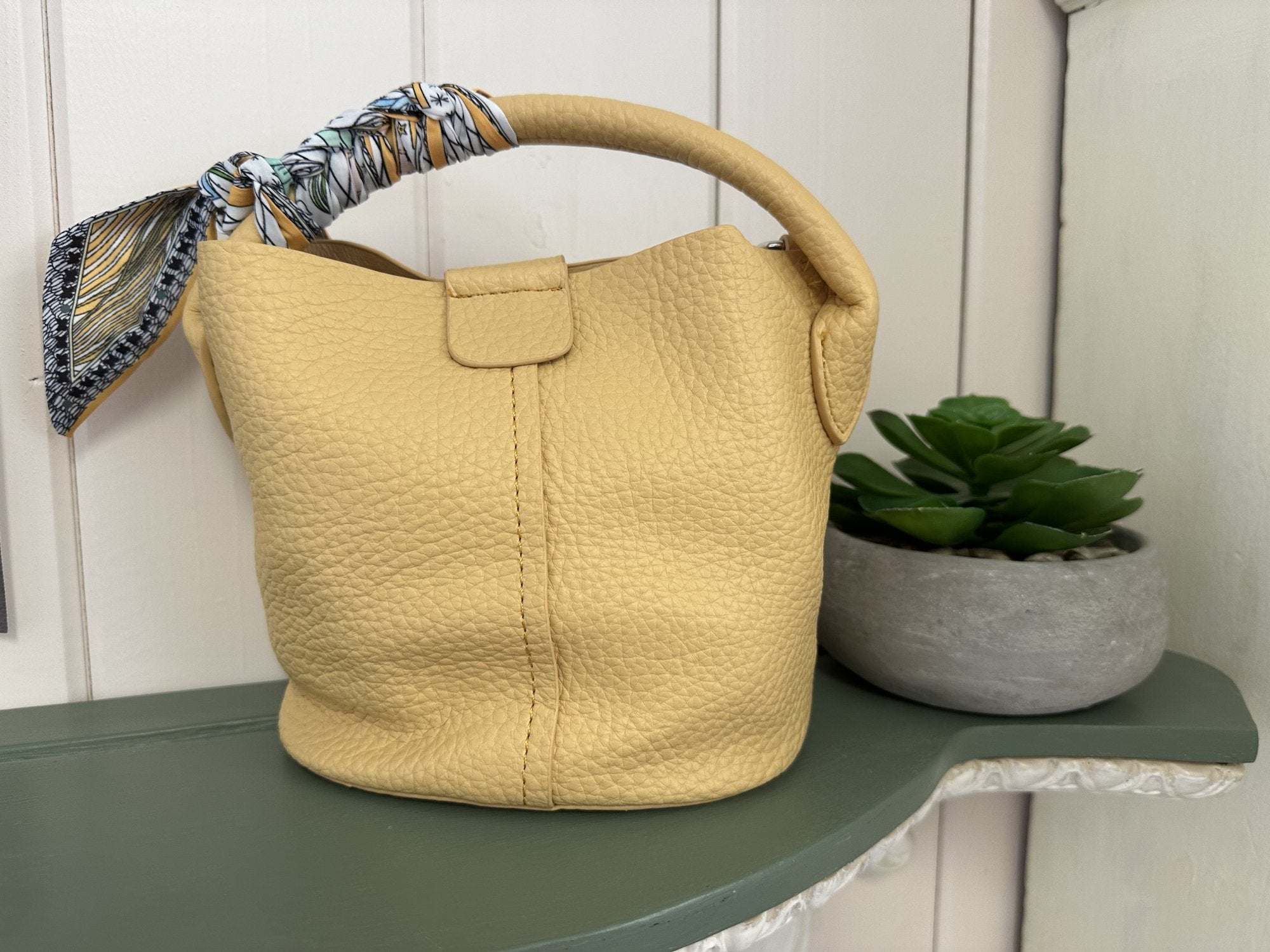 Talley Bag in yellow with scarf handle, ideal for coastal boutique clothing and summer outfits. Perfect for chic, on-the-go style.