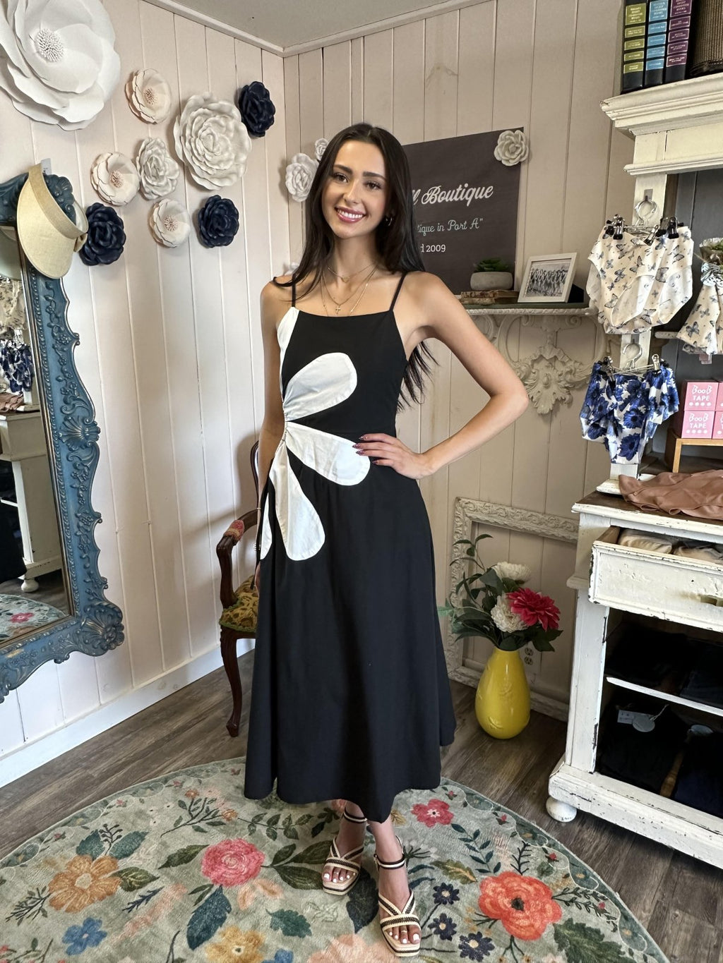Stylish black and off-white sleeveless Abigail dress, perfect for coastal boutique clothing and tropical vacation dresses.