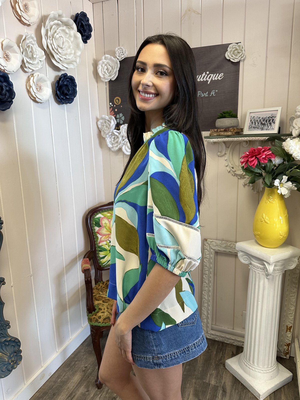 Vibrant Esme Top with tropical leaves print, perfect for summer outings. Coastal boutique clothing from Port Aransas.