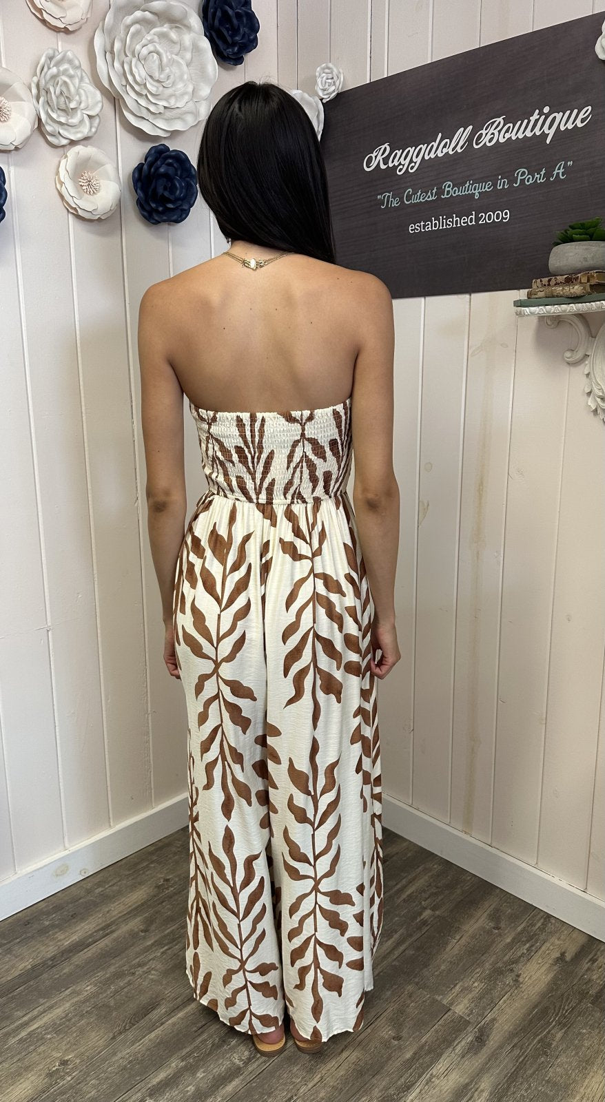 Dylan jumpsuit from Raggdell Boutique, showcasing stylish back design perfect for coastal outings and casual wear.
