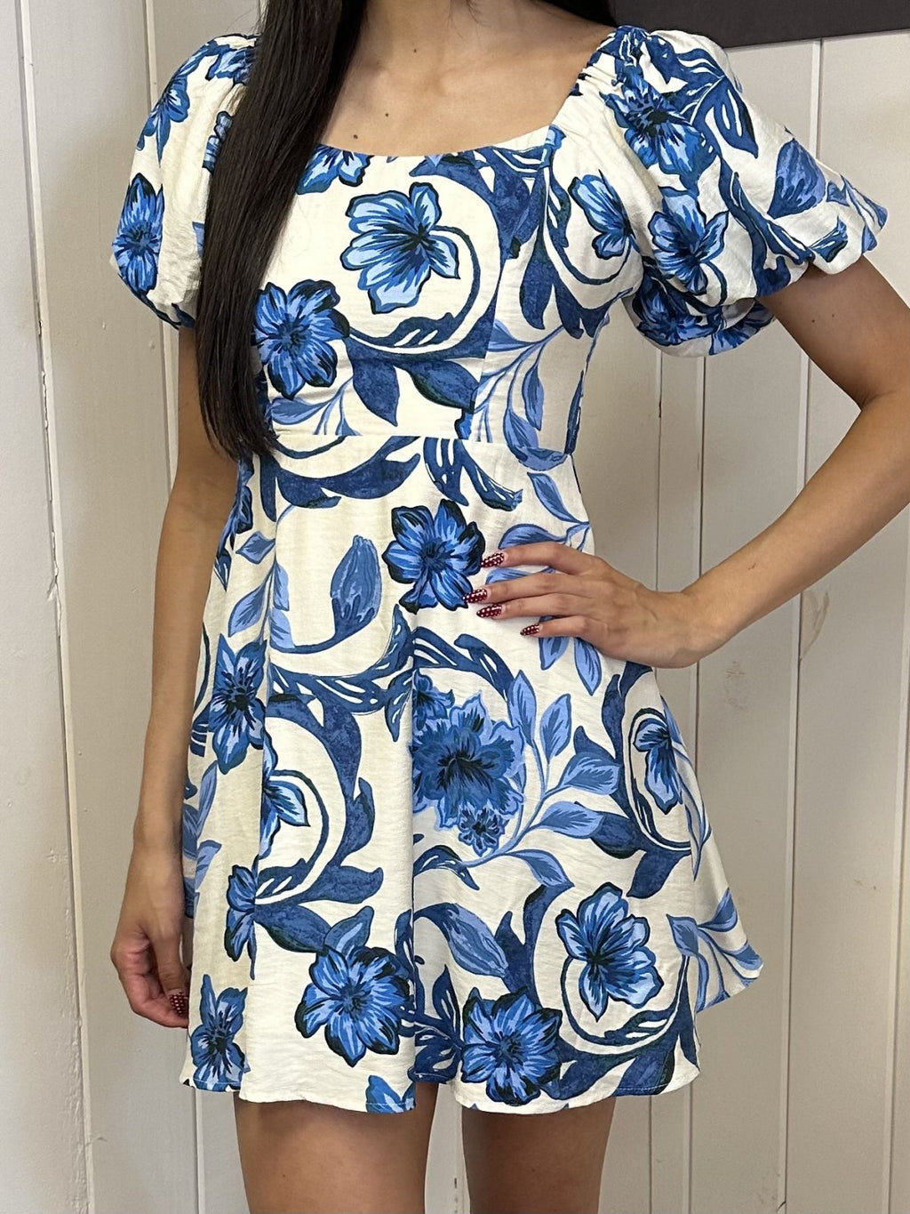 Clara Dress featuring blue floral design, perfect for coastal boutique clothing, tropical vacations, and curvy plus size fashion.