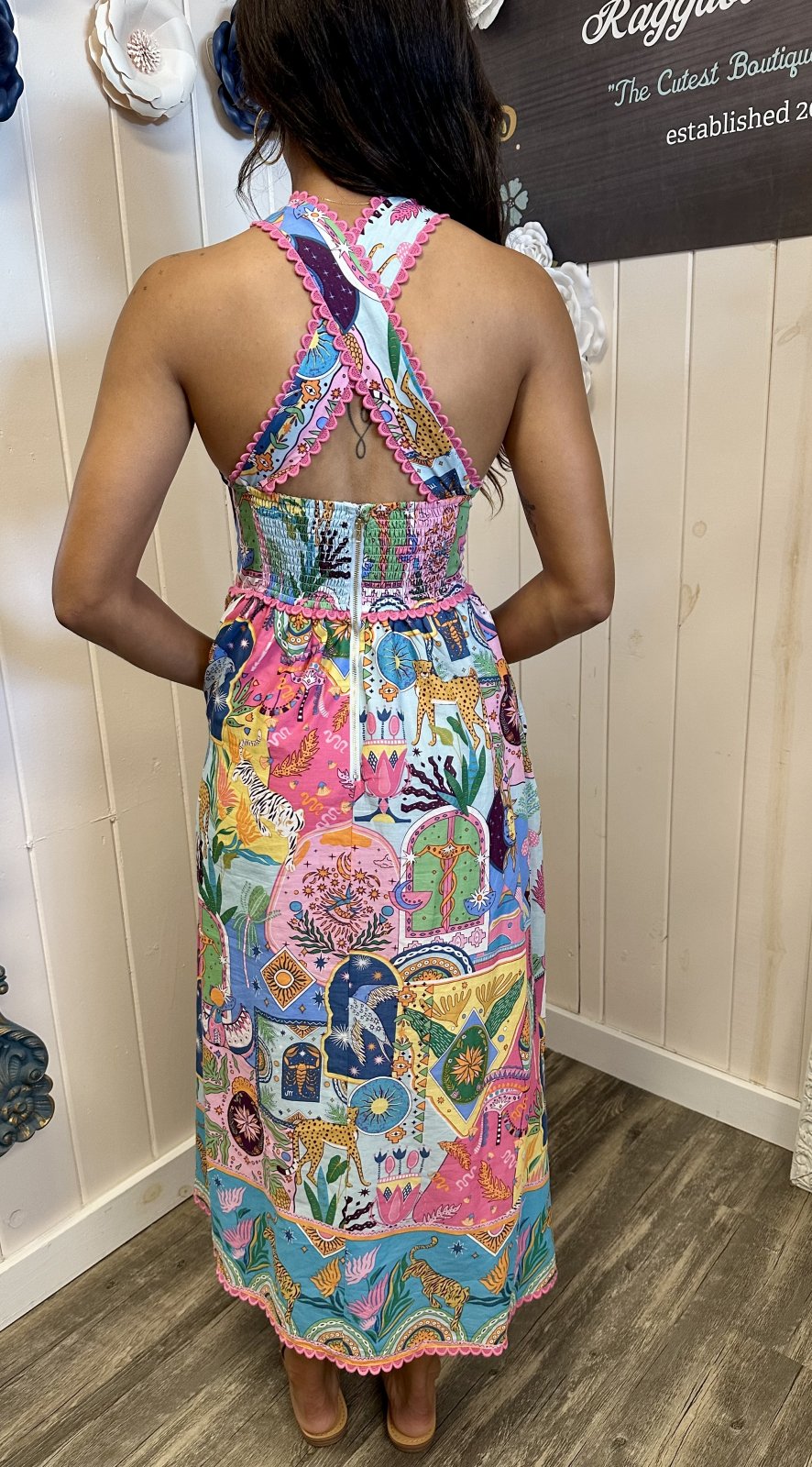 Colorful multi-colored Ric Rac Cross Midi Dress, showcasing playful design and adjustable straps, perfect for coastal boutique clothing.