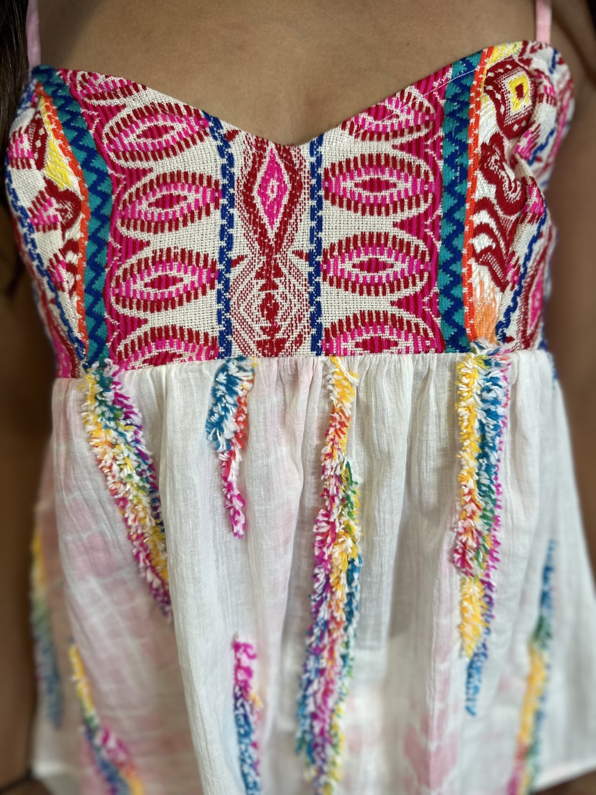 Multicolor boho embroidered sleeveless top for women, perfect for coastal boutique clothing and tropical vacation dresses.