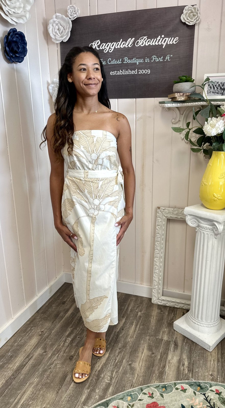 Stylish model wearing the Adele Dress from Raggdoll Boutique, showcasing coastal boutique clothing in Port Aransas.