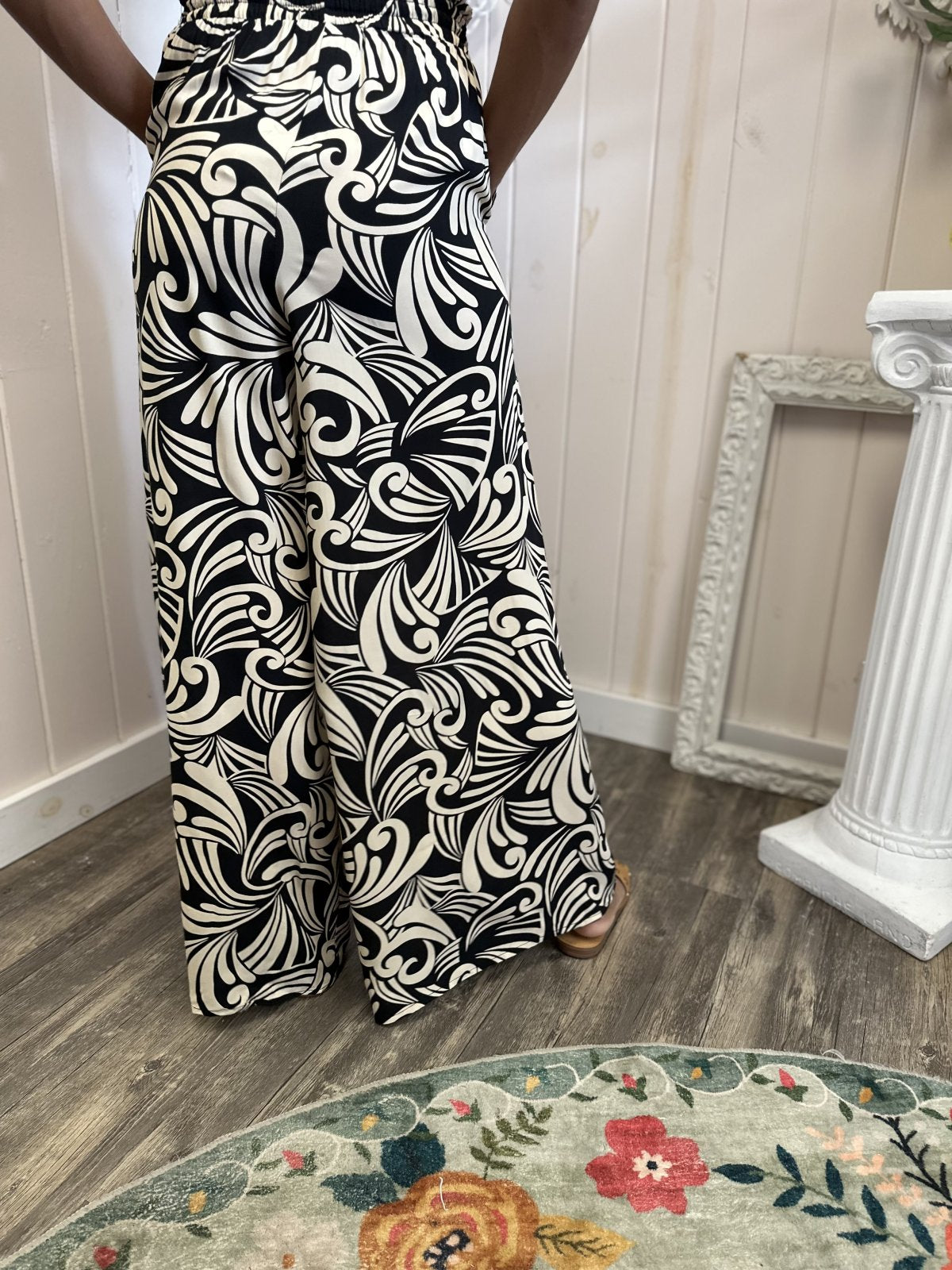 Elegant black and white wide leg Stella Pants showcasing a stylish design, perfect for coastal boutique clothing.