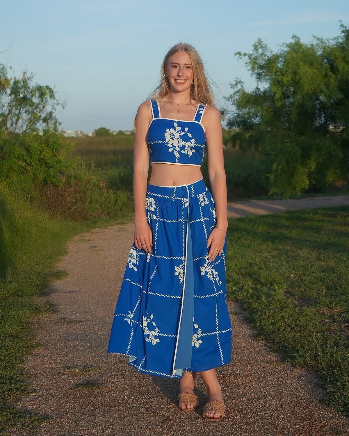 Charming cobalt blue two-piece floral set, perfect for coastal boutique clothing and stylish summer outings.