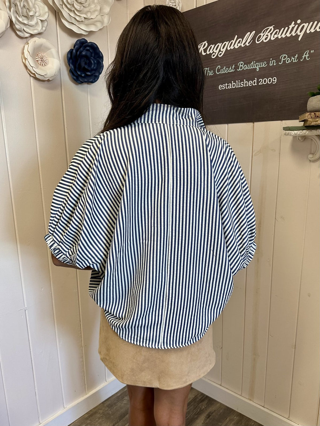Navy stripe high neck dolman top from coastal boutique clothing, showcasing stylish design and comfort, perfect for Port Aransas.