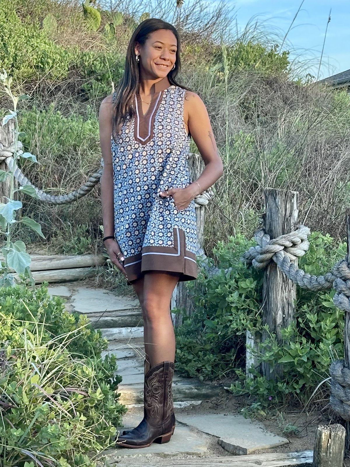 Charlotte Dress from Raggdoll Boutique, a chambray floral mini dress perfect for summer outfits in Texas.