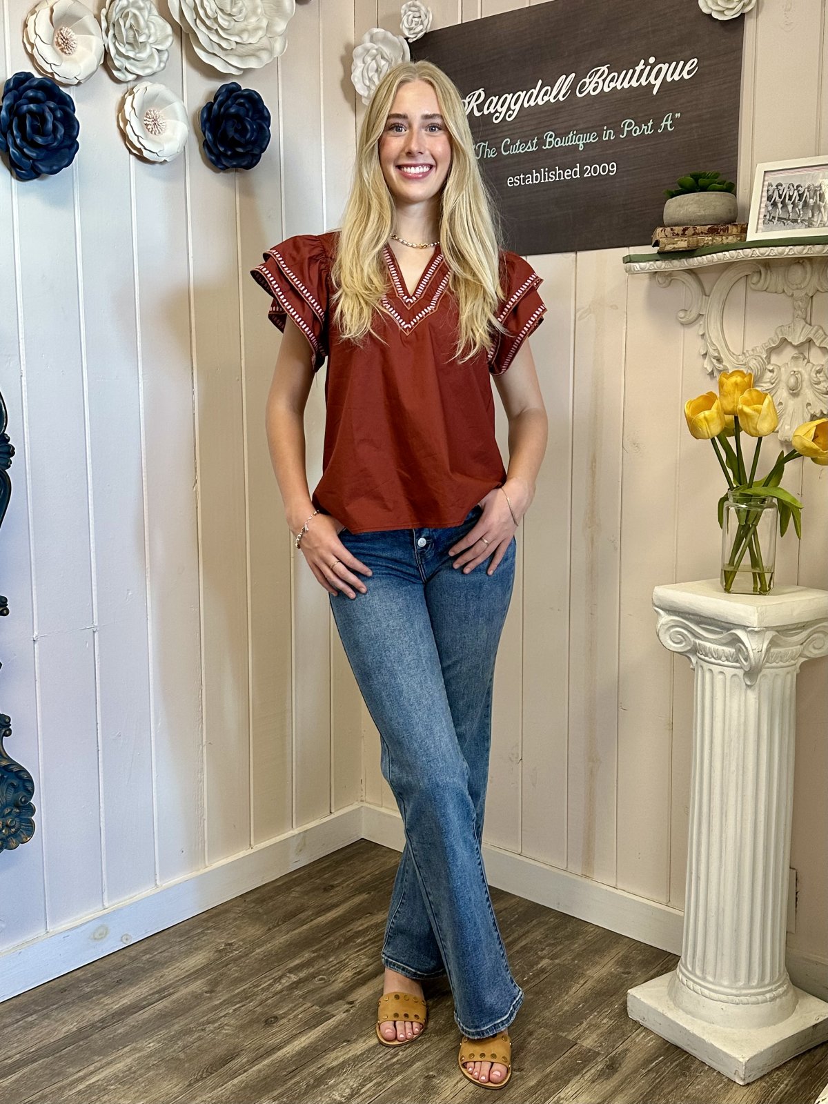 Willow Top from Raggdoll Boutique, featuring solid ruffle flutter sleeves and embroidered trim, perfect for summer outfits Texas.