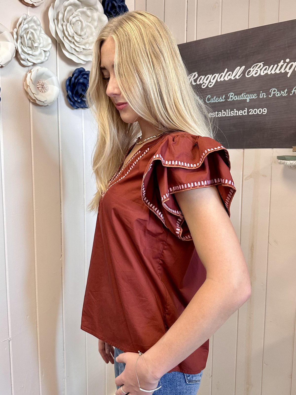 Willow Top – Solid Ruffle Flutter Sleeve Top with Embroidered Trim, available at Raggdoll Boutique.