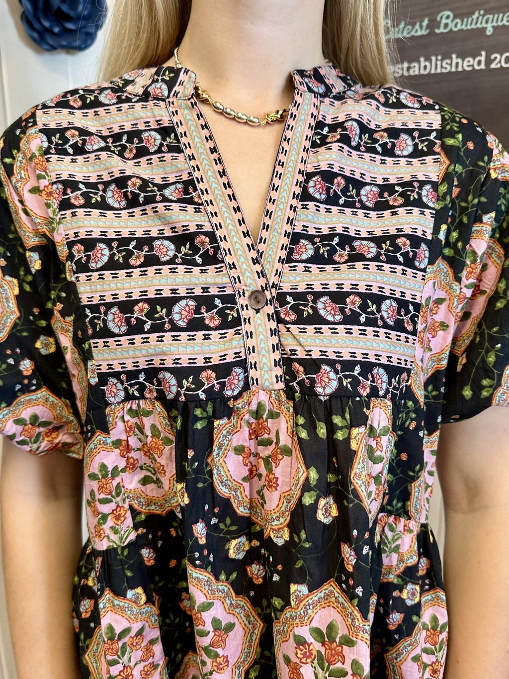 Sarah Top featuring floral patterns and a stylish design from Raggdoll Boutique, perfect for trendy coastal style.