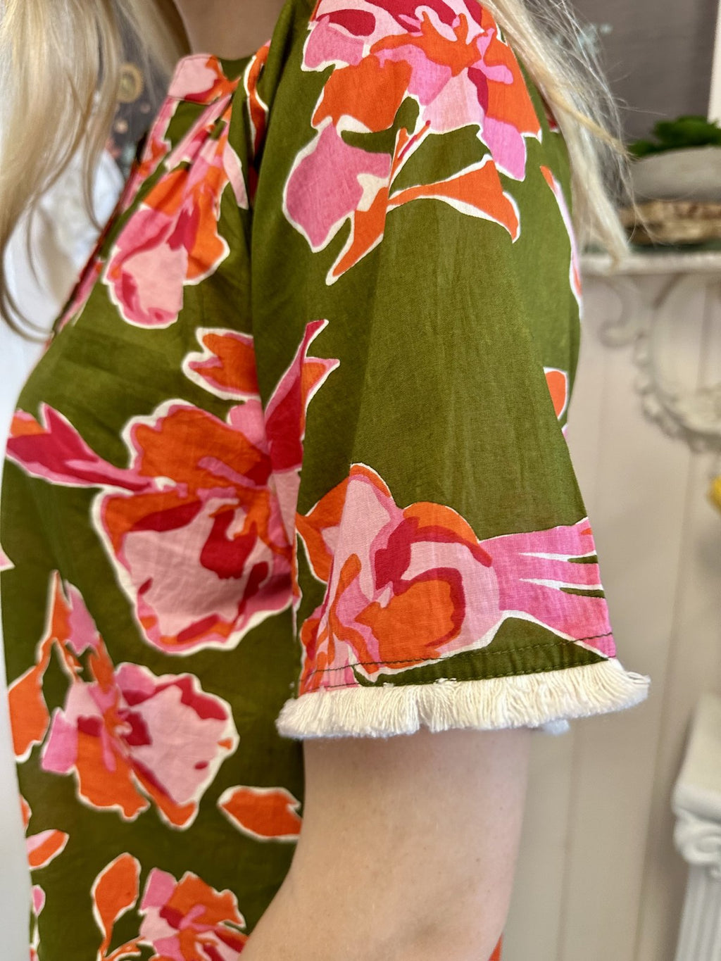 Stevie Top featuring olive green floral design with fringe sleeve detail from Raggdoll Boutique
