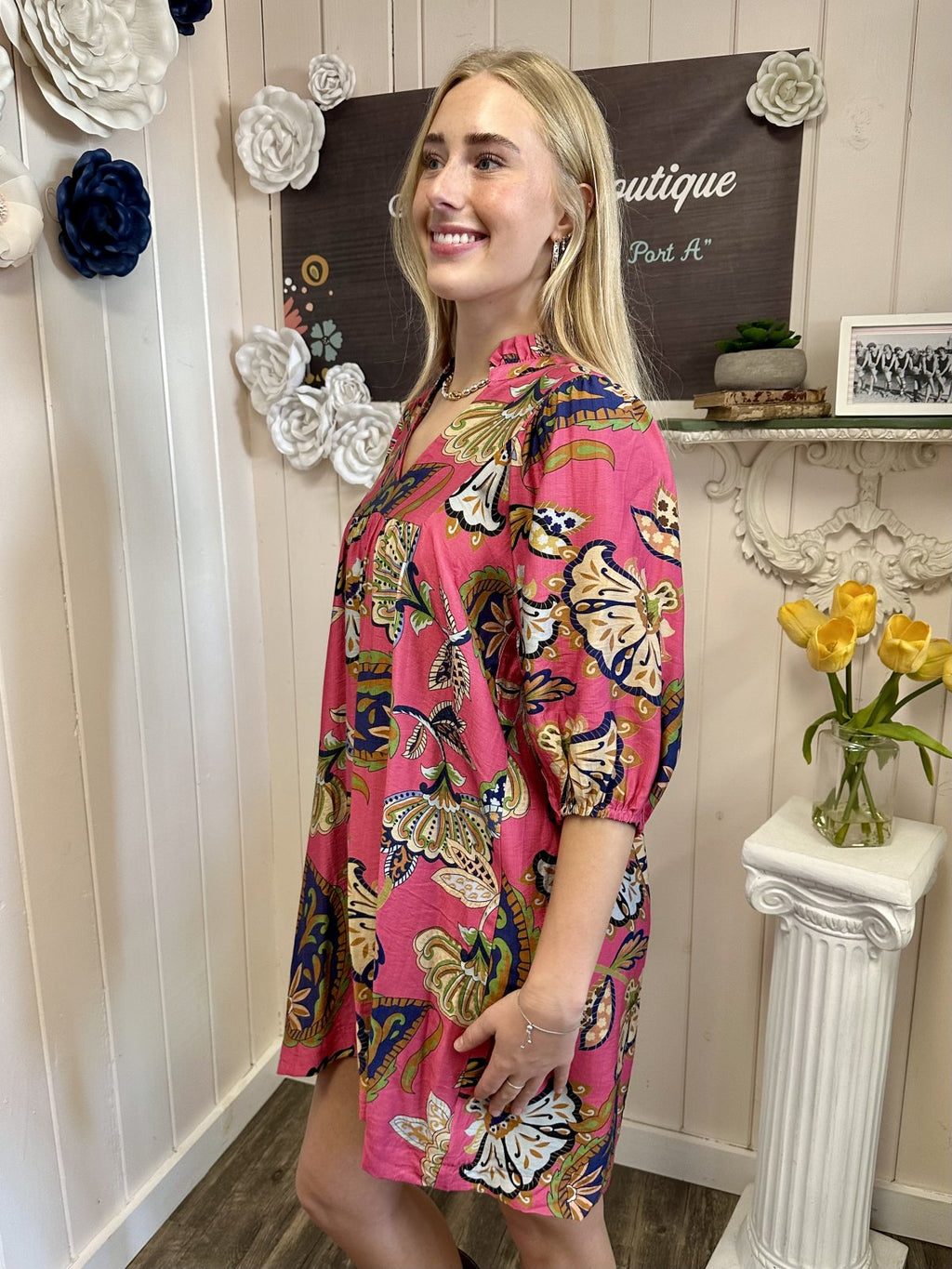 Pamela Dress from Raggdoll Boutique, featuring a pink abstract print babydoll style for trendy coastal fashion.