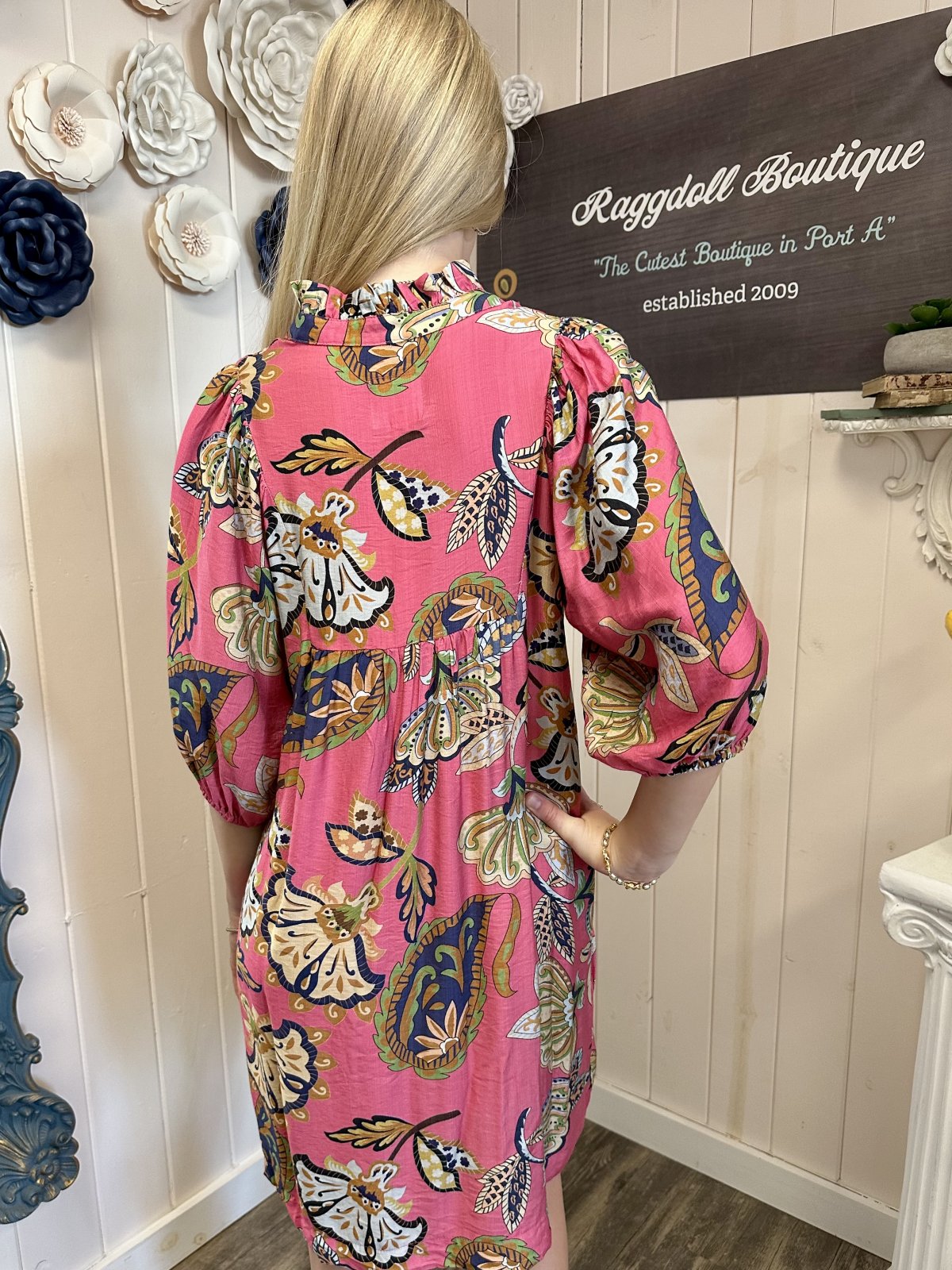 Pamela Dress in pink abstract print showcasing puff sleeves, perfect for summer outfits at Raggdoll Boutique.