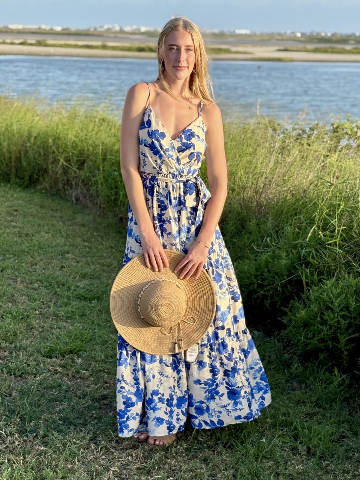 Bridget Dress: Blue floral print maxi dress, ideal for coastal boutique clothing and beach outings at Port Aransas.