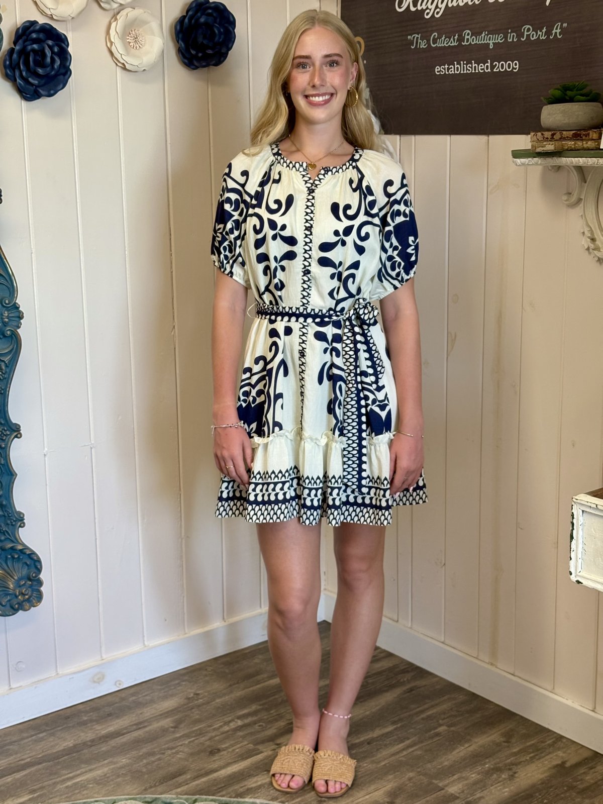 Ivory and navy border print shift dress, perfect for beach outings, from Port Aransas boutique, part of curated women's fashion.
