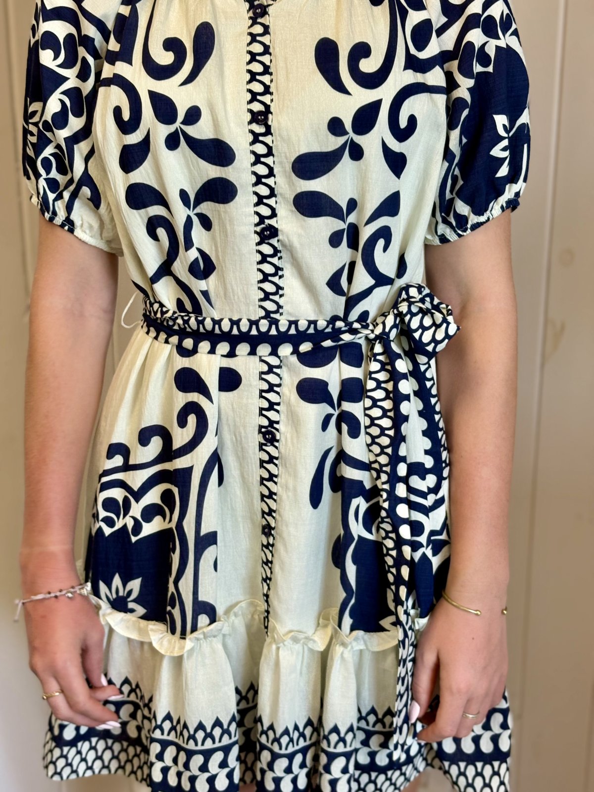Ivory and navy floral border print shift dress, perfect for Port Aransas boutique summer outings and coastal boutique clothing.