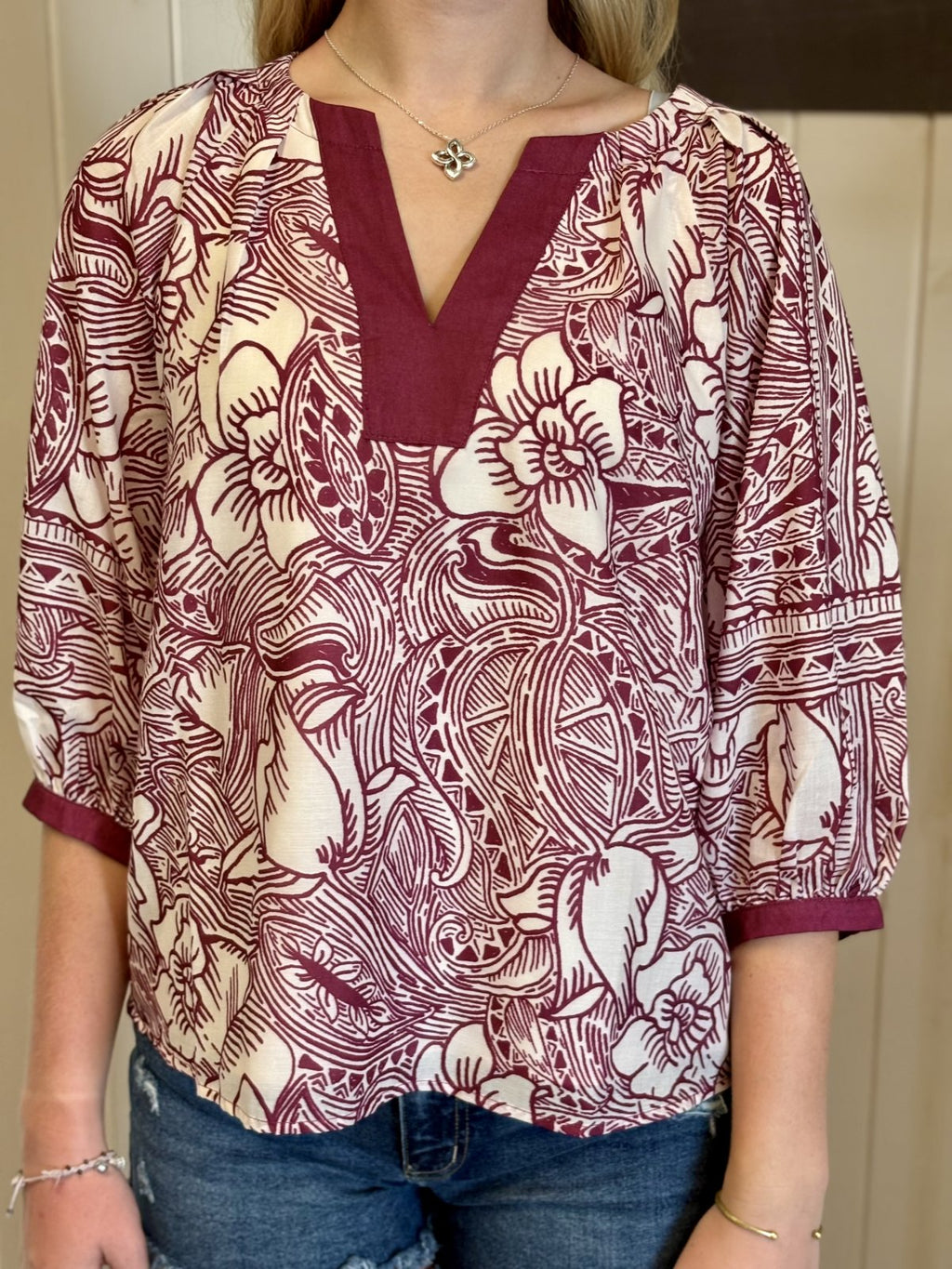 Aggie Top in maroon and white floral pattern, perfect for game day and casual outings, from a Port Aransas boutique.