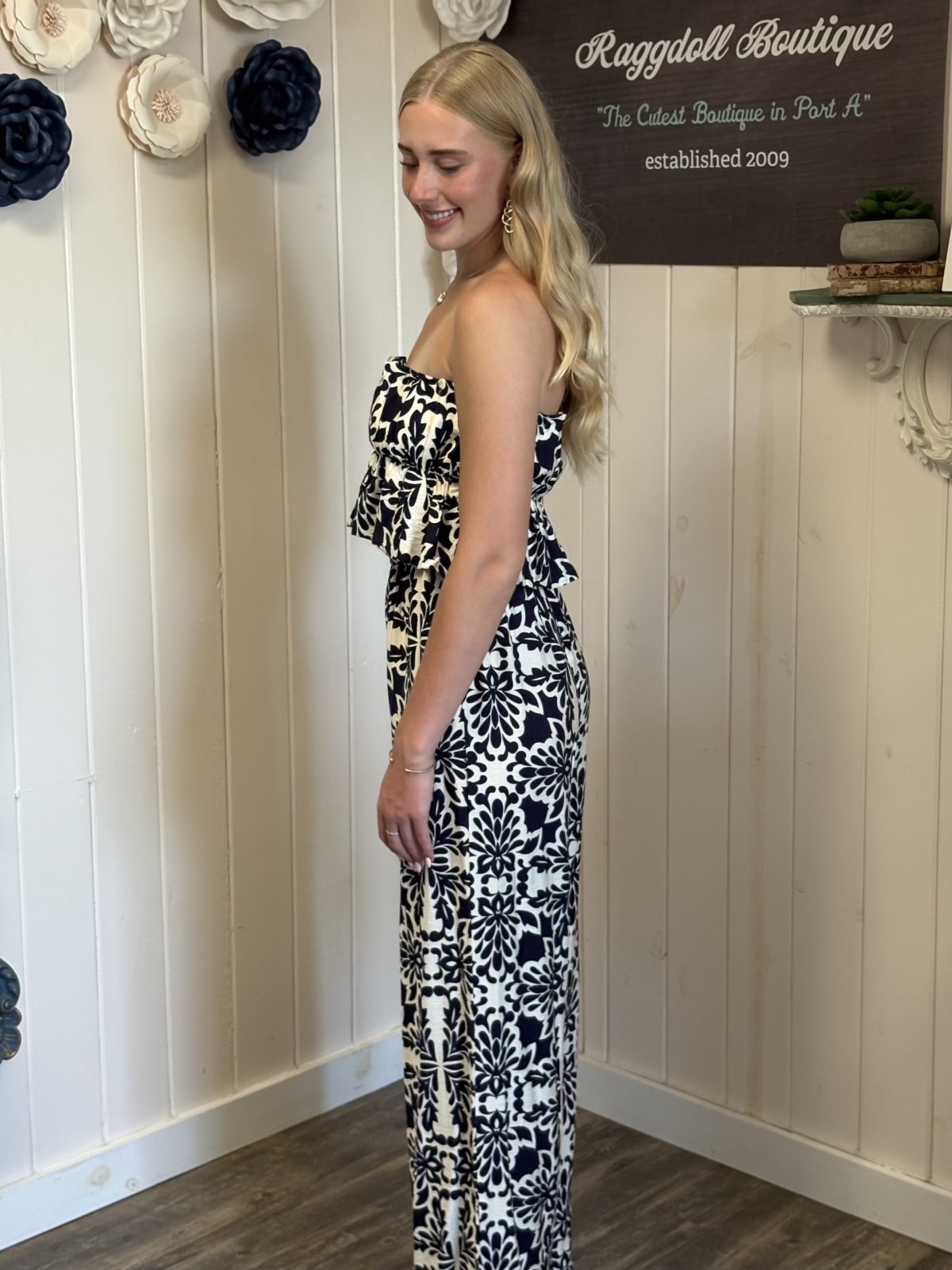 Stylish strapless navy and ivory printed jumpsuit, perfect for a tropical vacation. Coastal boutique clothing from Port Aransas.