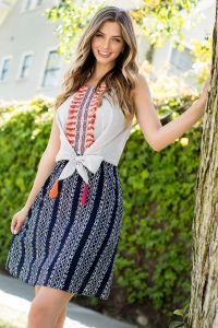 Model in STRIPES & PRINTS THML DRESS, perfect for beach outings; ideal for coastal boutique clothing and curvy plus size fashion.
