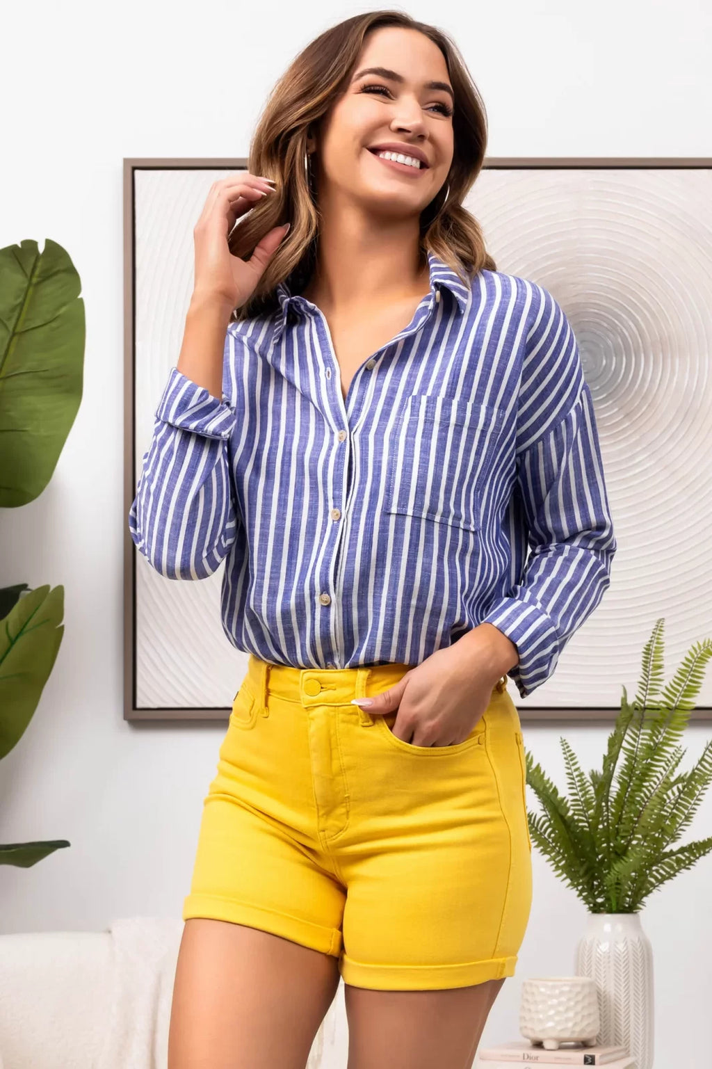 JUDY BLUE YELLOWED CUFFED SHORTS styled with a striped shirt, displayed at Raggdoll Boutique, ideal for trendy coastal style.