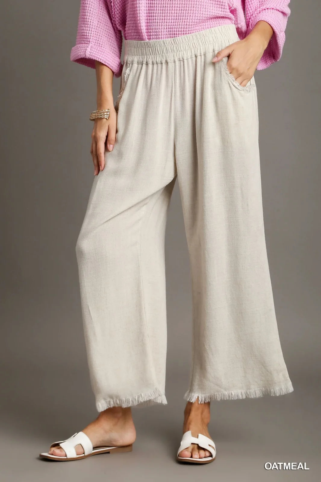 OATMEAL LINEN WIDE LEG PANTS (CALF LENGTH) styled with a trendy pink top, perfect for summer outfits Texas.