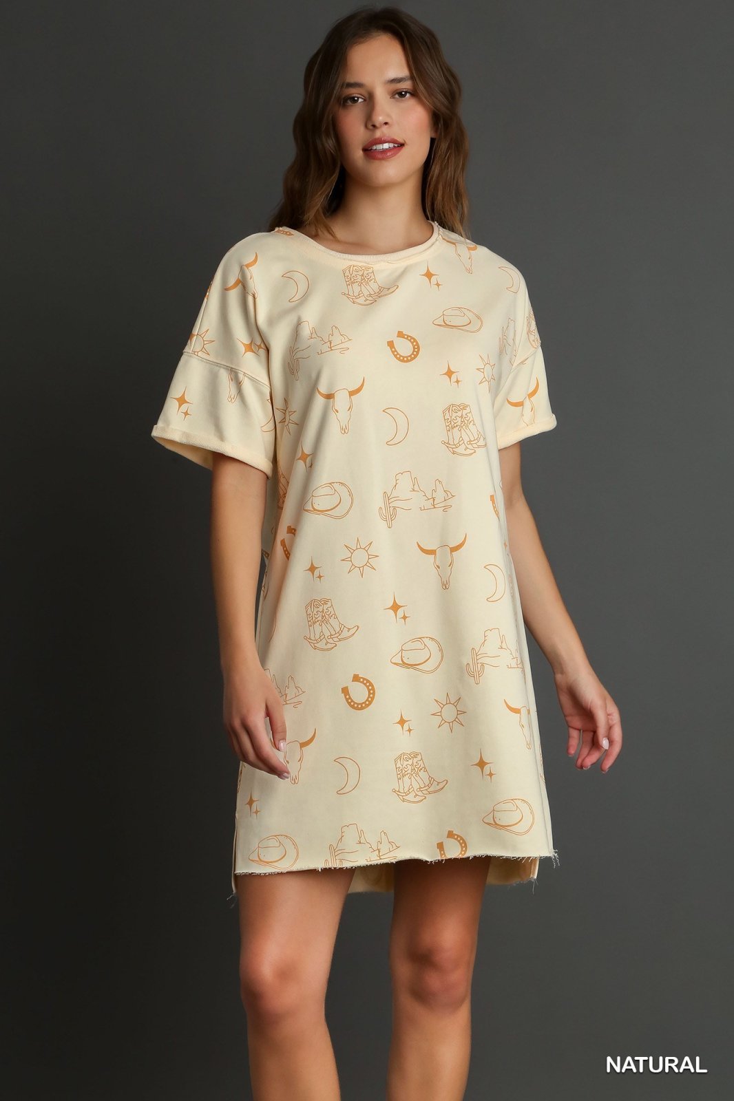 YEEHAW--NATURAL SHORT SLEEVE GRAPHIC DRESS at Raggdoll Boutique, showcasing trendy coastal style in Port Aransas.