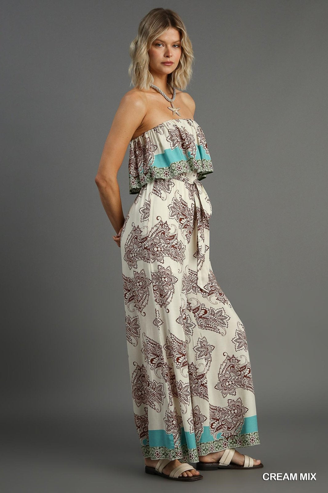 Sasha Jumpsuit showcased in a cream mix with trendy coastal style, perfect for women’s clothing Port Aransas, Raggdoll Boutique.