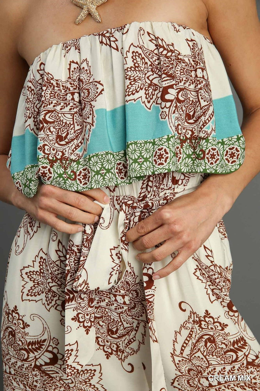Sasha Jumpsuit in a floral pattern, perfect for trendy coastal style at Raggdoll Boutique, Port Aransas boutique.