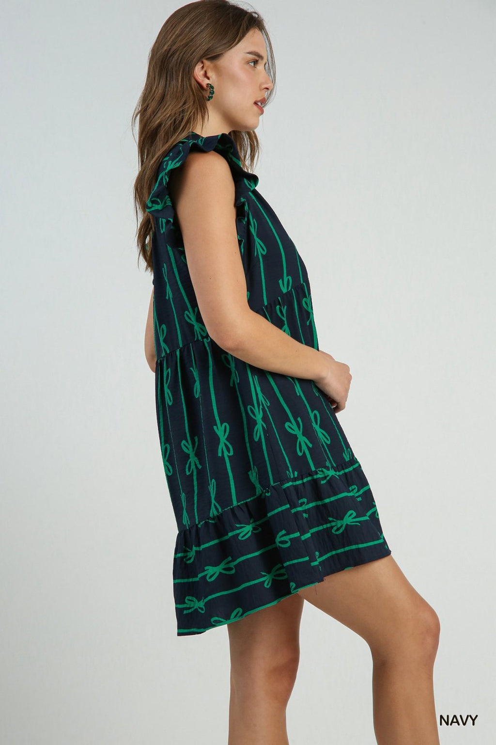 Ribbons and Bows Dress from Raggdoll Boutique, featuring trendy coastal style in navy and green.
