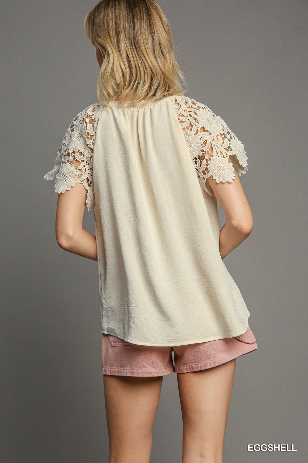 Back view of Lanie Top featuring lace sleeves, perfect for trendy coastal style from Raggdoll Boutique.