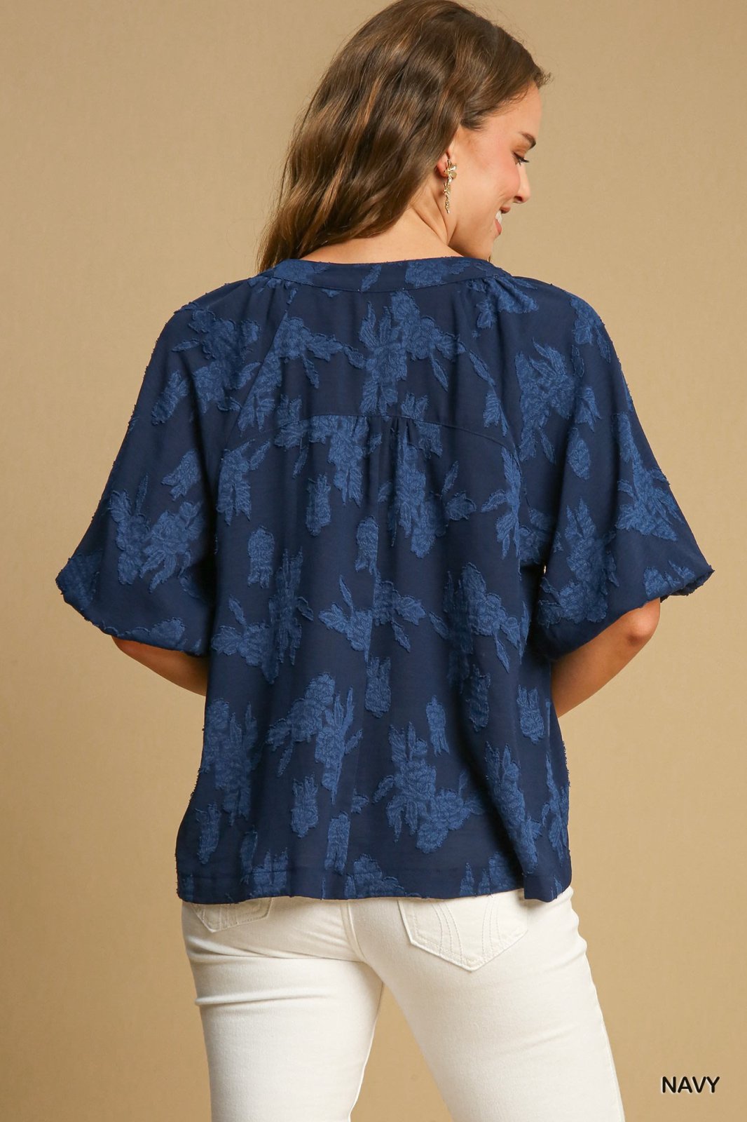 Navy floral burnout top with bubble sleeves, perfect for stylish coastal boutique clothing and tropical vacations.