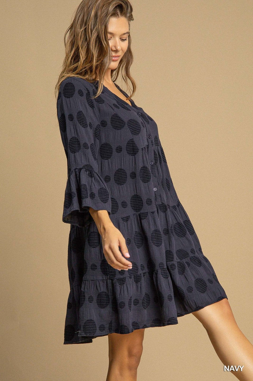 Jana Dress in navy, featuring a stylish polka dot design, perfect for coastal boutique clothing and tropical vacations.
