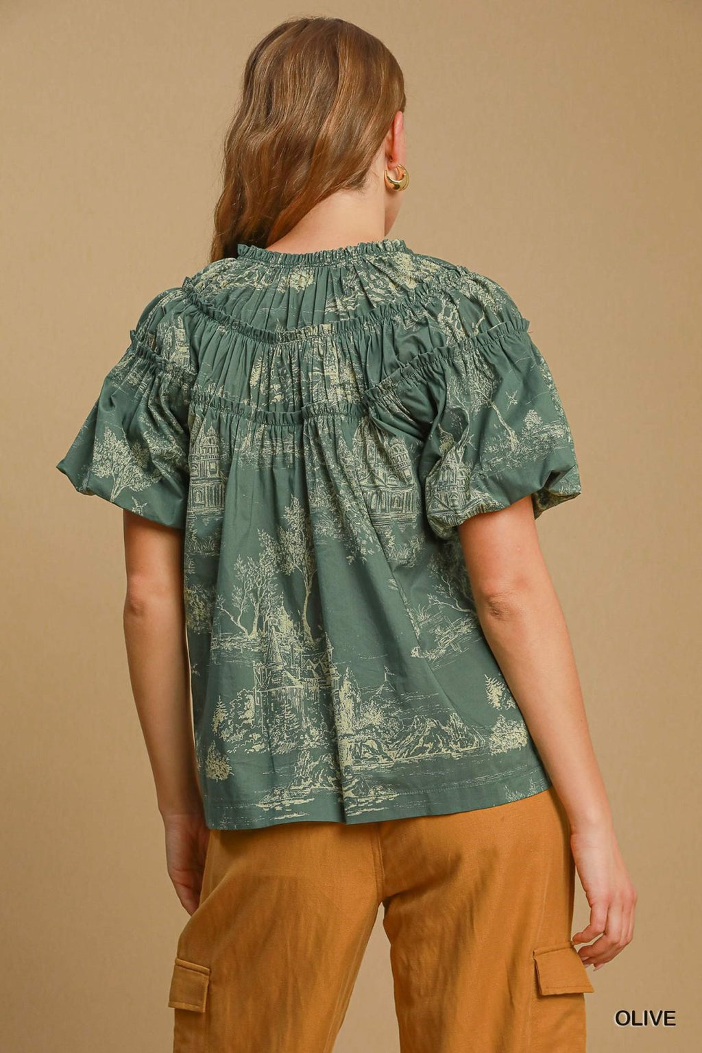 Back view of stylish olive top, perfect for coastal boutique clothing and tropical vacation dresses.