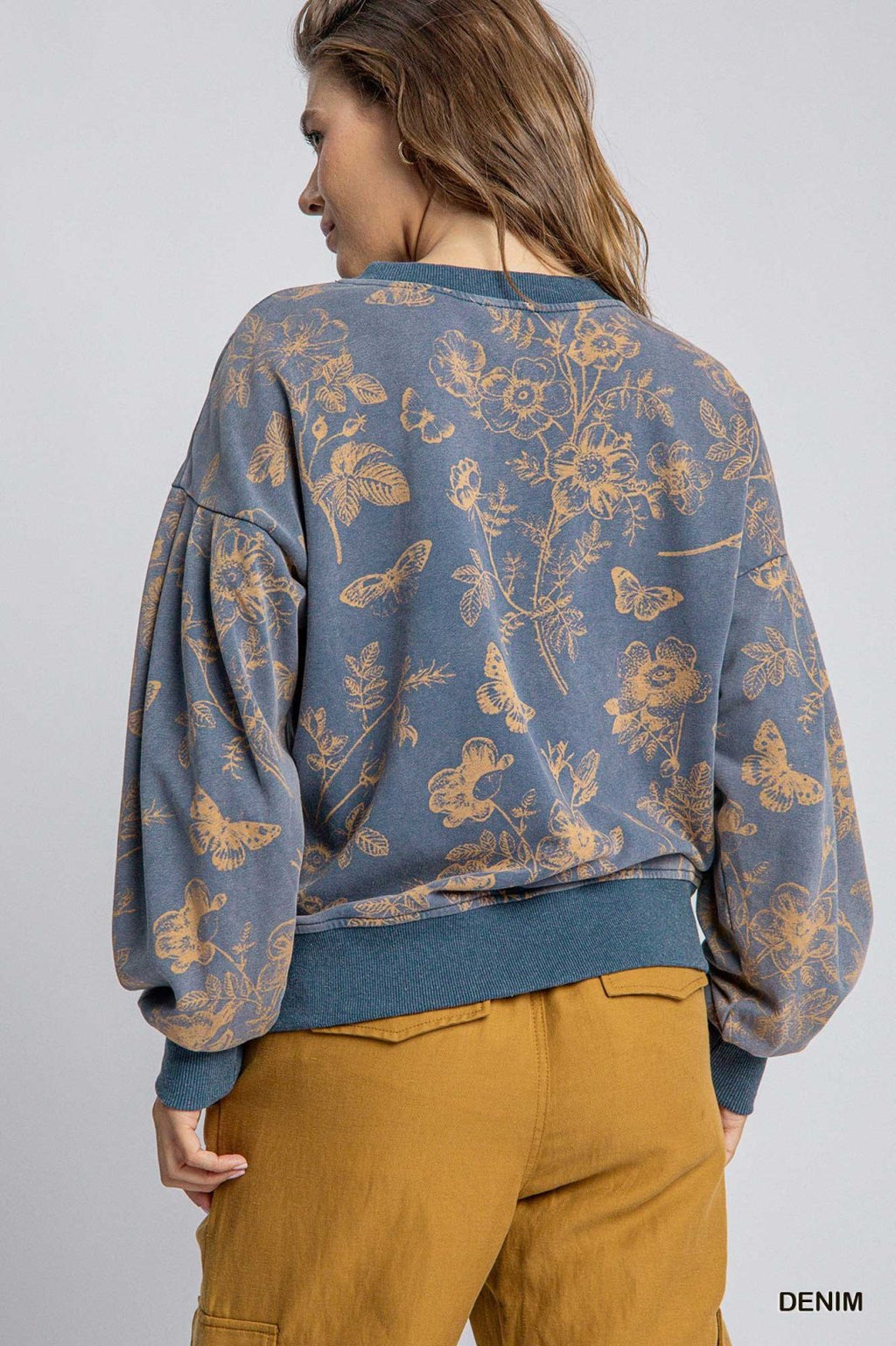 Stylish French Terry floral top in denim, perfect for coastal boutique clothing and tropical vacation dresses.