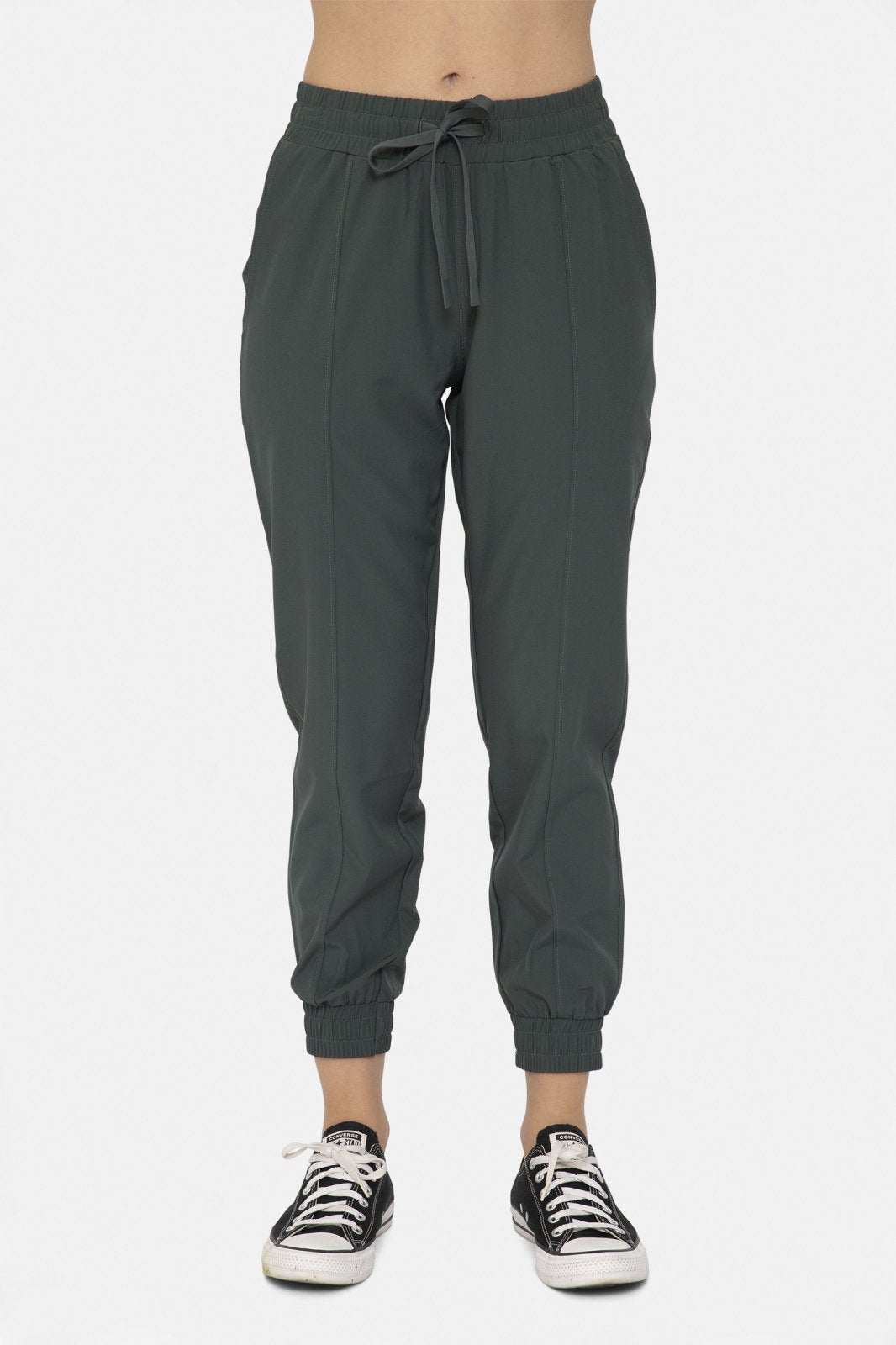 Stylish jungle green cuffed joggers made of 92% Polyester and 8% Spandex, perfect for women's casual wear at coastal boutiques.