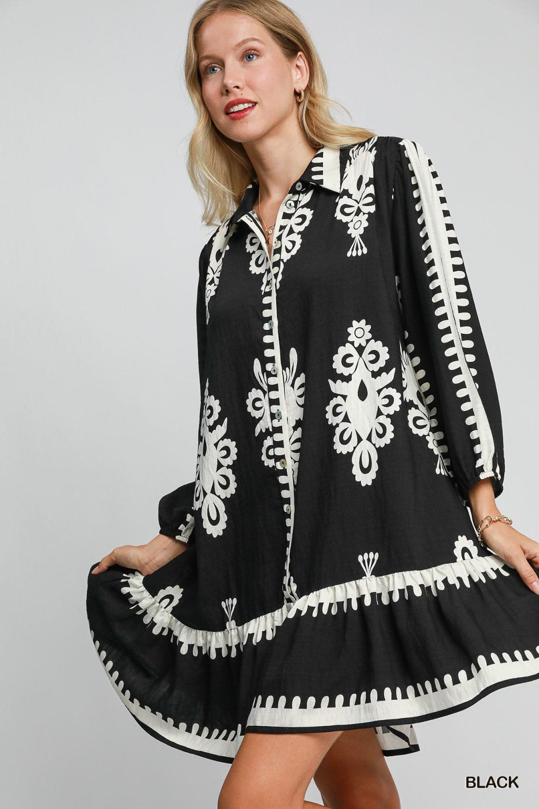 Chic black and white Melinda Dress, perfect for tropical vacations. Discover coastal boutique clothing at our Port Aransas boutique.