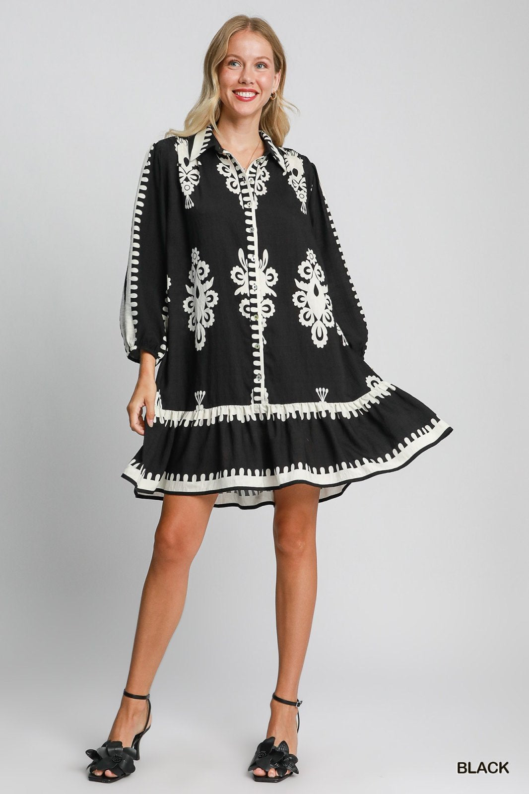 Melinda Dress: Black coastal boutique clothing with stylish embroidery, perfect for beach days, tropical vacations.