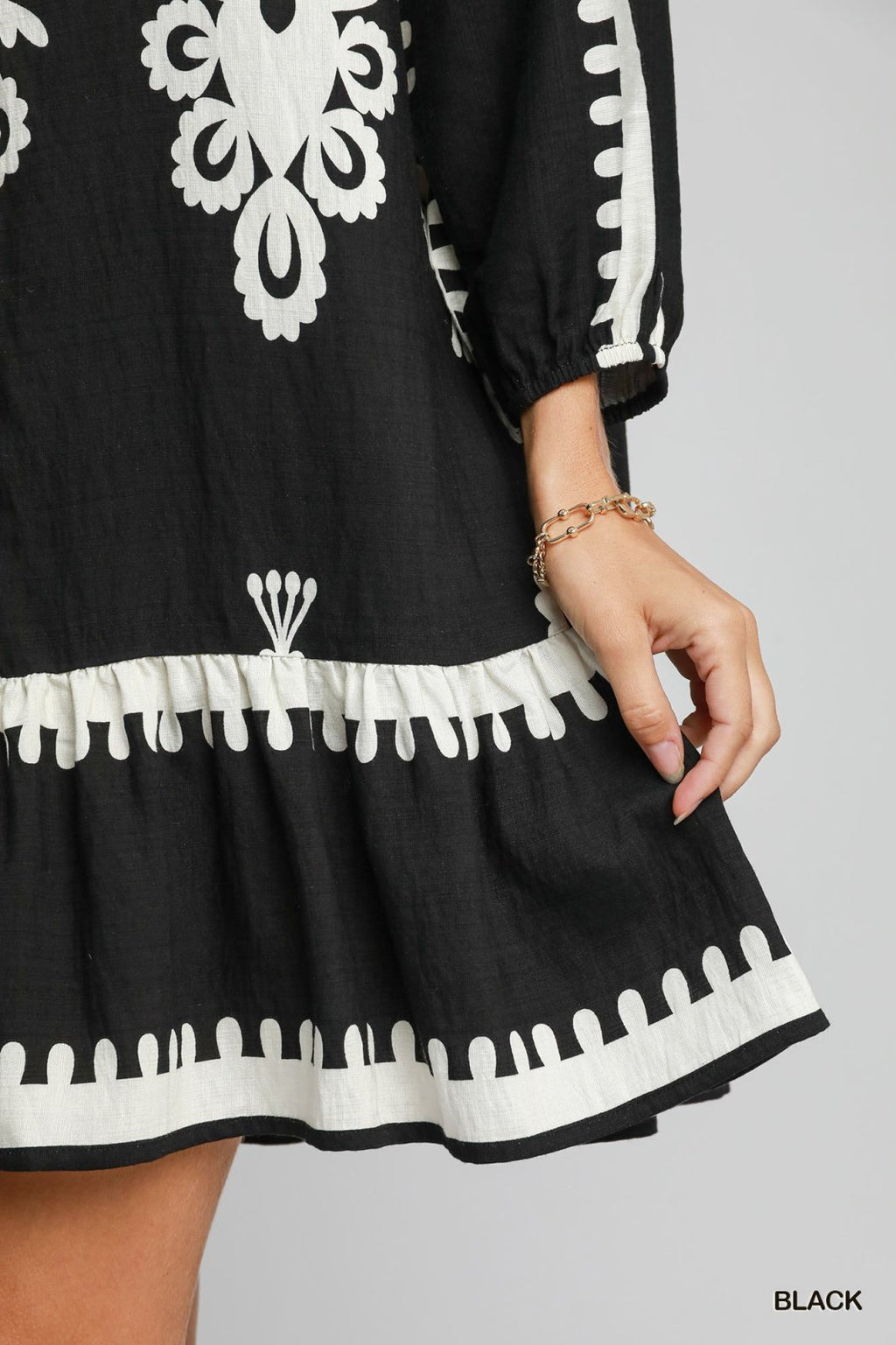 Melinda Dress in black, featuring chic embroidery, perfect for coastal boutique clothing and tropical vacation dresses.