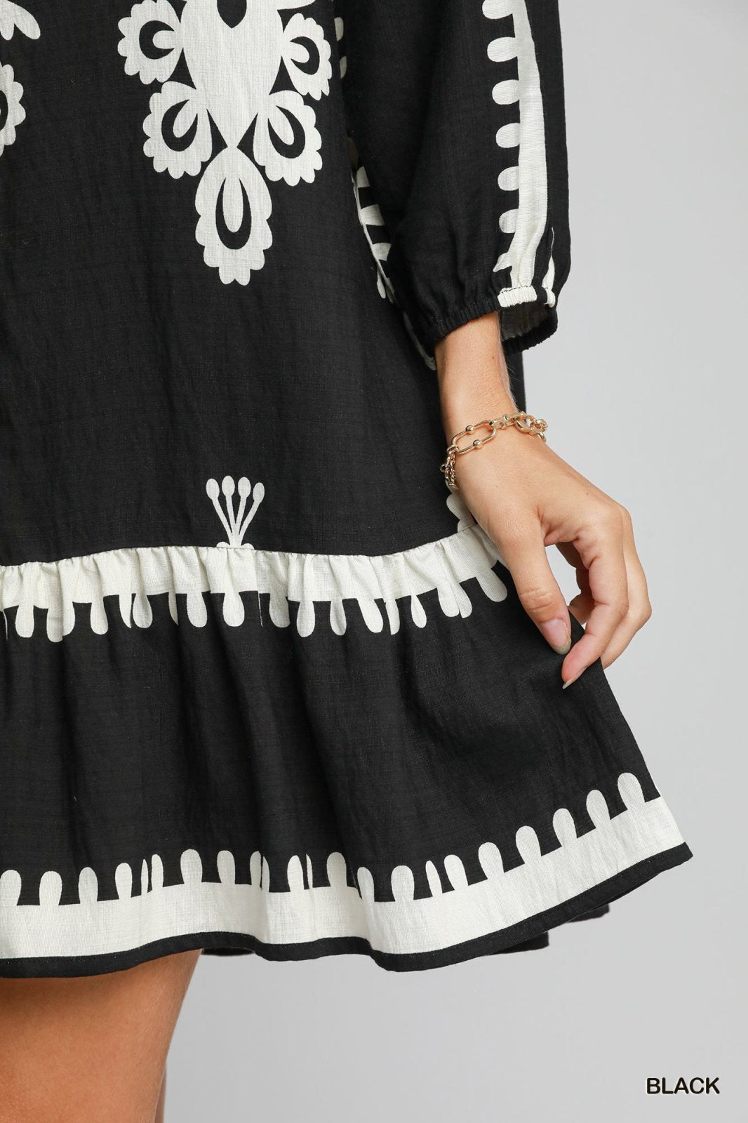 Melinda Dress in black, featuring chic embroidery, perfect for coastal boutique clothing and tropical vacation dresses.