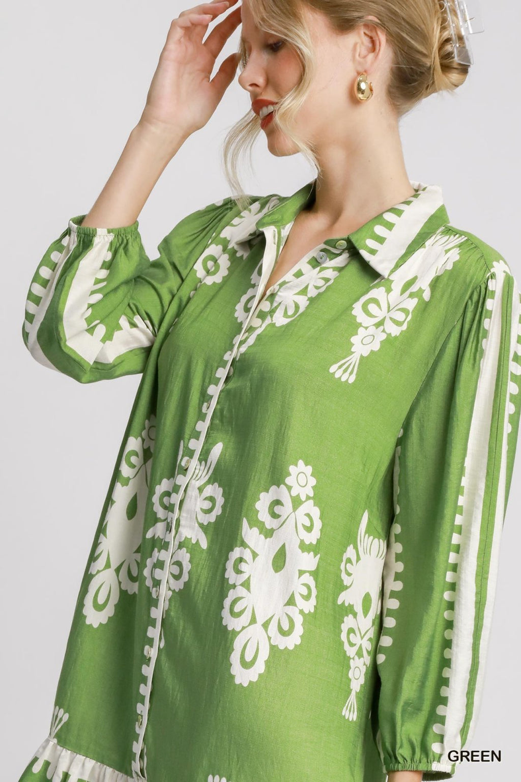 Mara Dress in green, featuring stunning white patterns, perfect for coastal boutique clothing and tropical vacations.