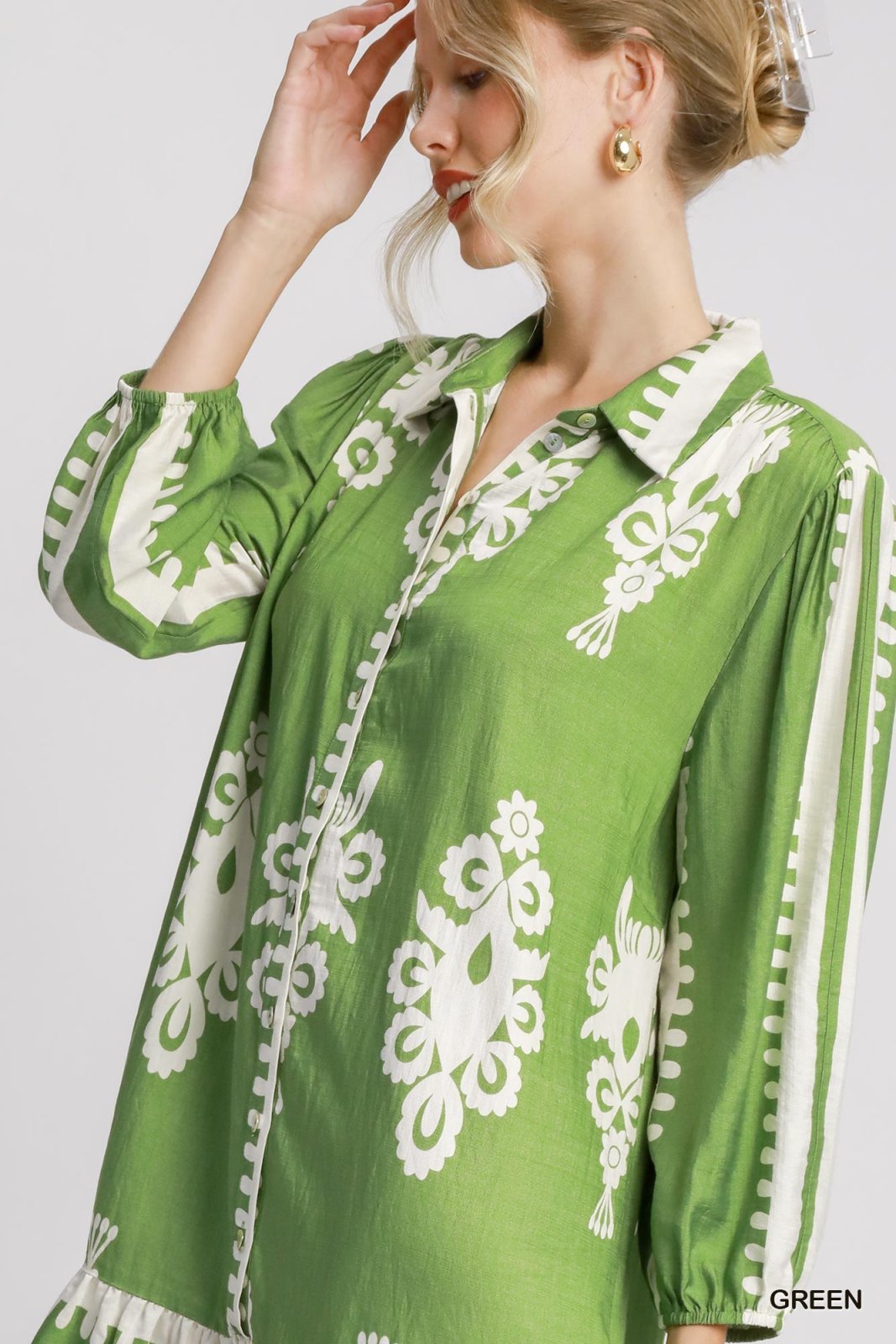 Mara Dress in green, featuring stunning white patterns, perfect for coastal boutique clothing and tropical vacations.