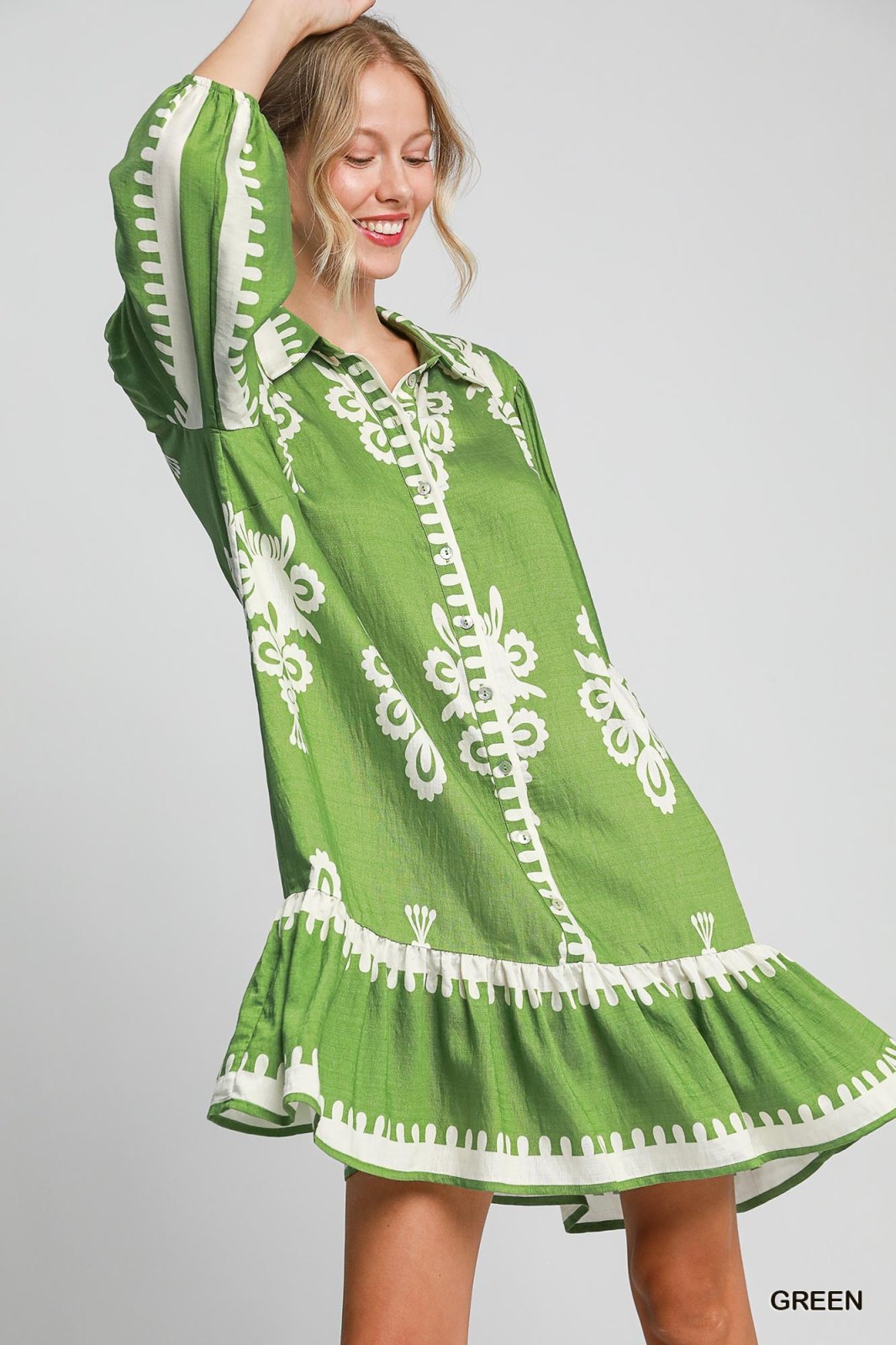 Mara Dress in vibrant green, perfect for tropical vacations, featuring stylish embroidery for coastal boutique clothing lovers.