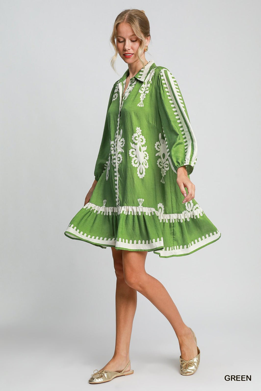 Mara Dress in green, featuring intricate embroidery. Ideal for coastal boutique clothing and tropical vacation dresses.